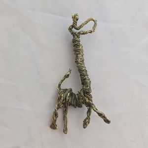 Vintage gold Mr. WE coiled wire giraffe brooch